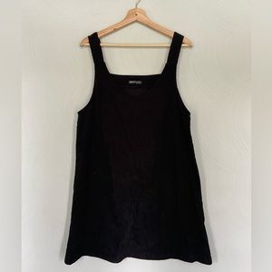 Black 90s style corduroy smock dress.